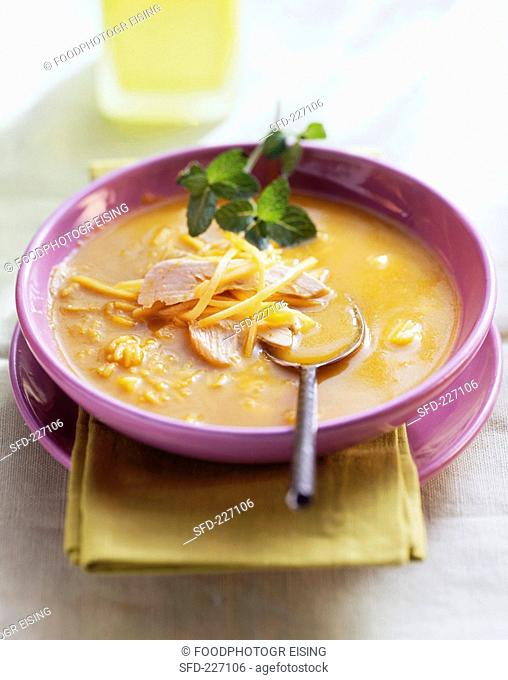 Mango soup with chicken breast and fresh mint