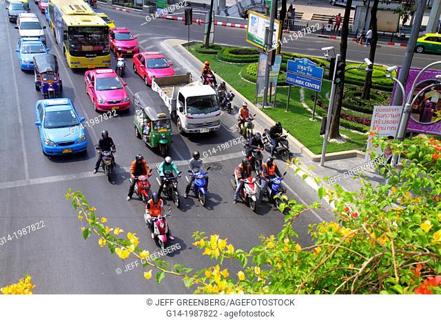 Thailand, Bangkok, Pathum Wan, Phaya Thai Road, traffic, taxi, taxis, cabs, motorcycles, motor scooters, buses, auto rickshaw, tuk-tuk, sam-lor, Skywalk, view