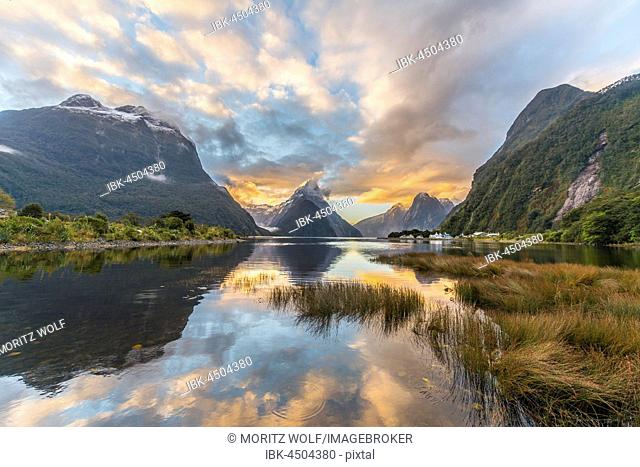 Mitre Peak reflecting in the water, sunset, Milford Sound, Fiordland National Park, Te Anau, Southland Region, Southland, New Zealand
