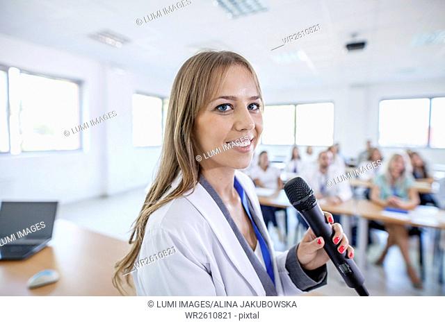 Female doctor giving presentation in training class