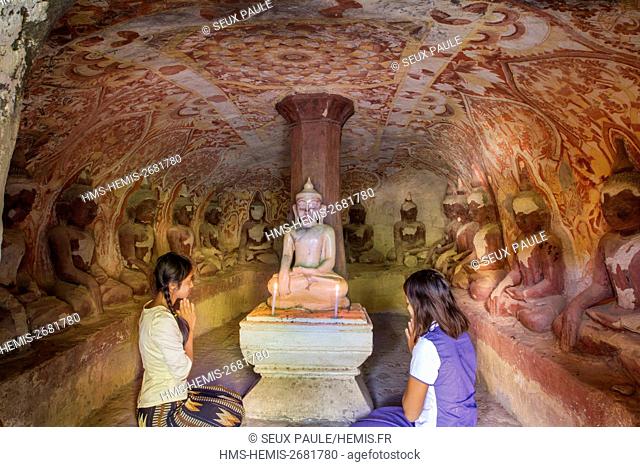 Myanmar (Burma), Sagaing region, Monywa, Hpo Win Daung, cave number 307, white marble Buddha and sixteen Buddhas statues carved in the rock