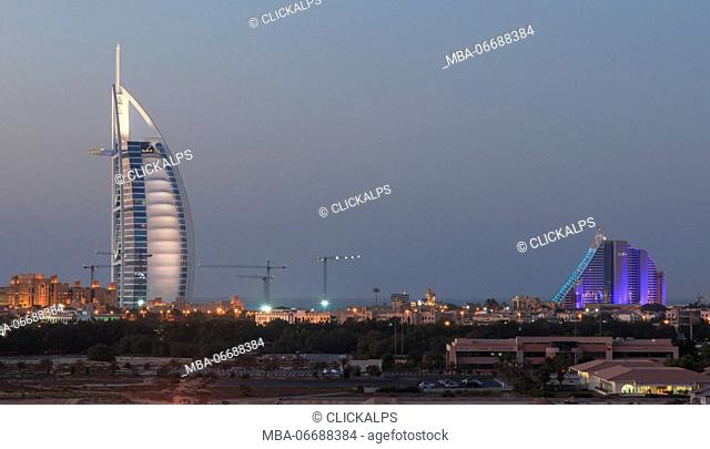 Dubai, United Arab Emirates. A night shot of Dubai's most well known landmarks : The Burj Al Arab and Jumeraih Beach Hotel