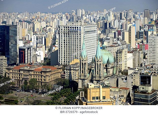 Skyscrapers, sea of houses, Cathedral da Se and Praca da Se square at front, São Paulo, São Paulo, Brazil