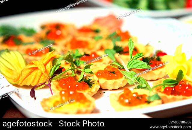 Close up of tarlet with red caviar