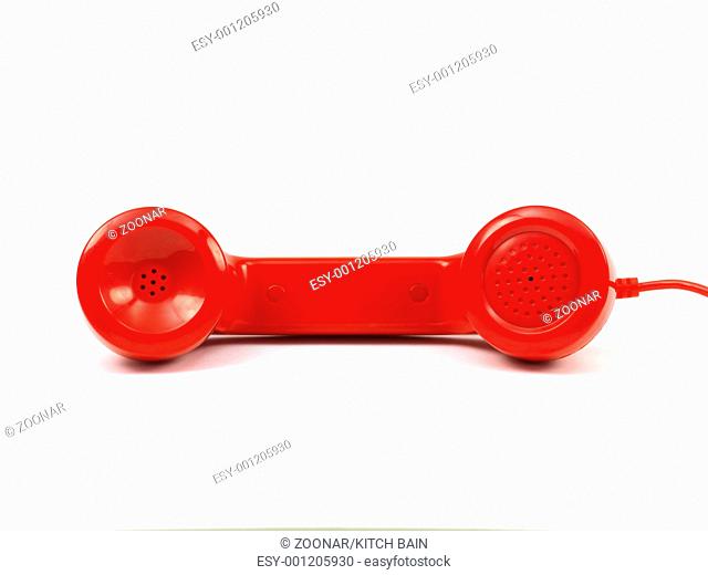 A rotary telephone hand set isolated against a white background