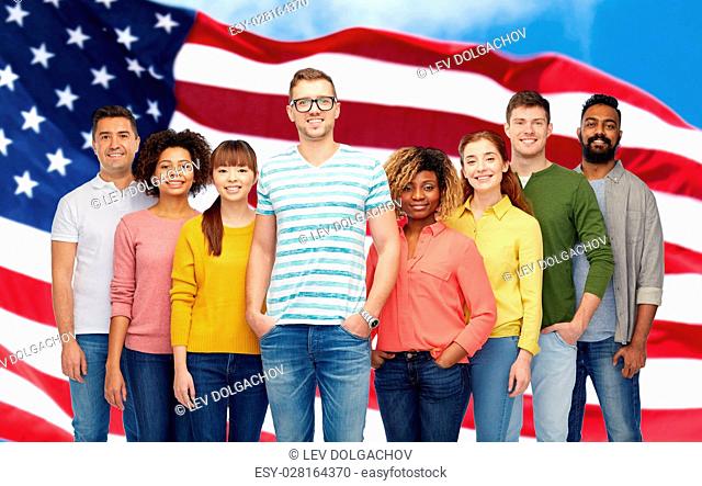 diversity, race, ethnicity and people concept - international group of happy smiling men and women over american flag background