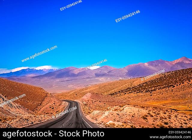 Empty paved road through Nevado Sajama National Park in Bolivia