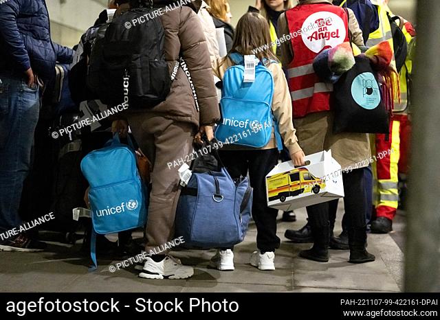 07 November 2022, North Rhine-Westphalia, Dortmund: Evacuated Ukrainian war refugees wait at the airport after a flight from Moldova for onward transport in...