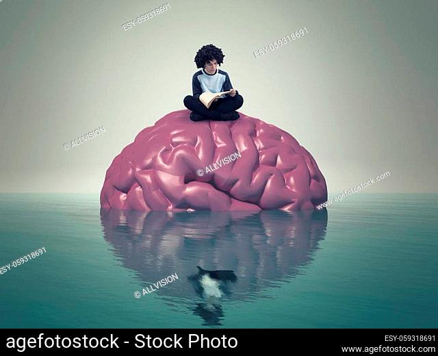 Young man reading on a brain in water