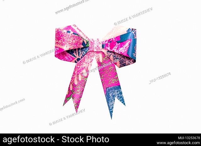 Pink paper ribbon on a white background