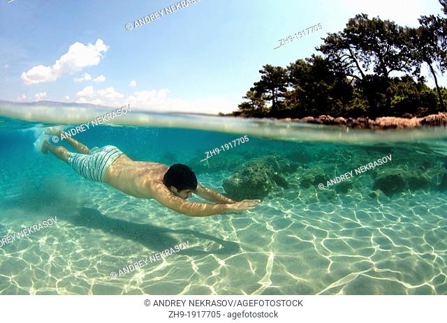 Man diving, Cleopatra island Sedir Island, Aegean Sea, Turkey