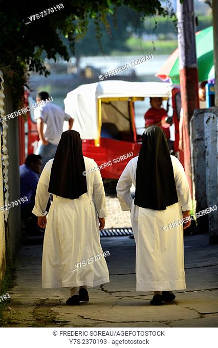 Nuns in Isla de Flores, Guatemala, Central America