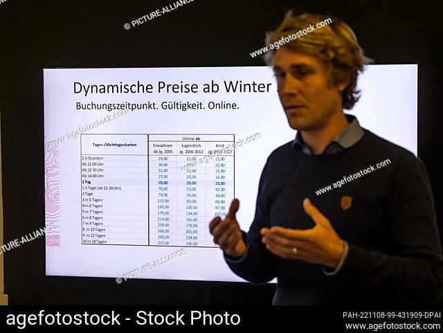 08 November 2022, Baden-Wuerttemberg, Todtnau: Julian Probst, Managing Director of Feldbergbahnen, speaks while a table with prices for the coming winter season...