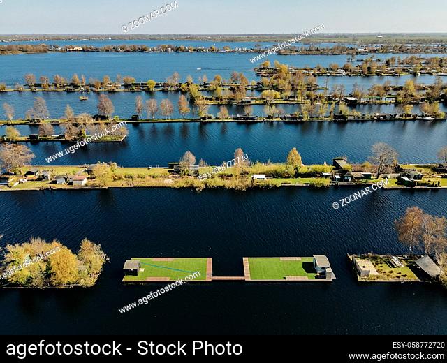 Aerial view of small islands in the Lake Vinkeveense Plassen, near Vinkeveen, Holland. It is a beautiful nature area for recreation in the Netherlands