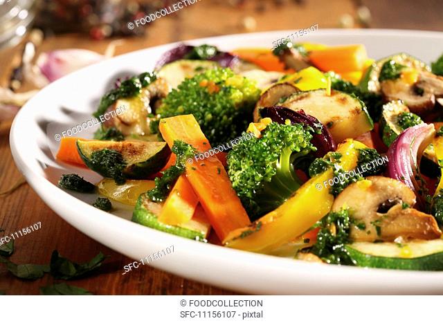 A mixture of fried vegetables and mushrooms