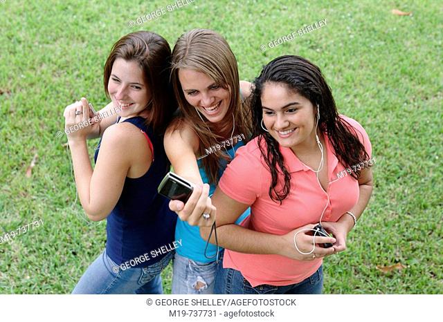 Group of teens taking a picture or themselves