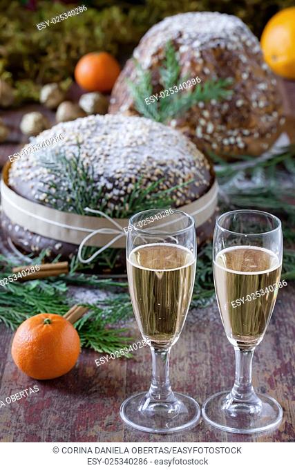 Glasses of champagne and panettone, italian traditional way to celebrate The New Years Eve