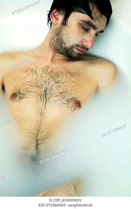 Hairy naked men in a bath