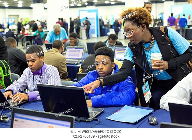Detroit, Michigan - Young African-American men apply for jobs online at a job fair sponsored by the nonprofit My Brother's Keeper