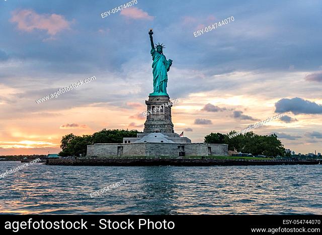 Statue of Liberty National Monument at sunset. New York City