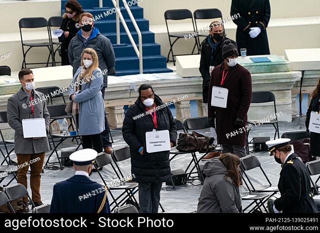 A stand in for former President president Barack Obama participates in during a dress rehearsal ahead of the 59th Inaugural Ceremonies on the West Front of the...