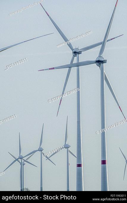 Wind turbines against blue sky, Germany