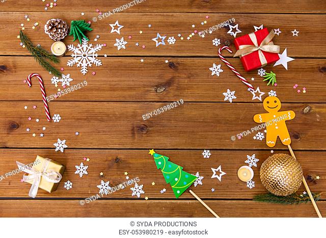 christmas gifts and decorations on wooden boards