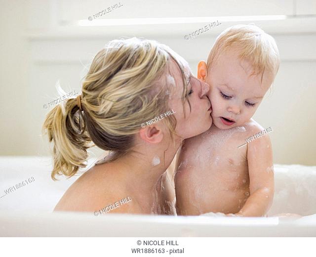 mother and baby taking a bubble bath