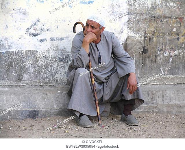 Man with muslim headgear and cane in poor area of Cairo, Egypt, Kairo, Kairo