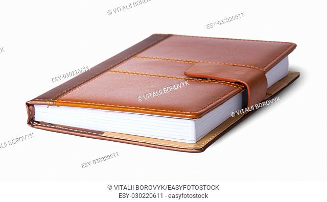 Closed notebook in leather cover isolated on white background