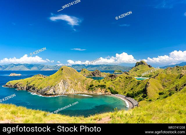 High-angle view of an idyllic seascape from Indonesia with the coastline of Padar Island in a sunny day of summer