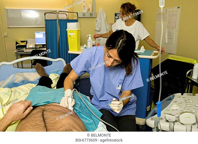 Photo essay at Saint-Louis hospital, Paris, France. Department of nephrology. Local anesthesia before the renal biopsy on a patient who received has a kidney...