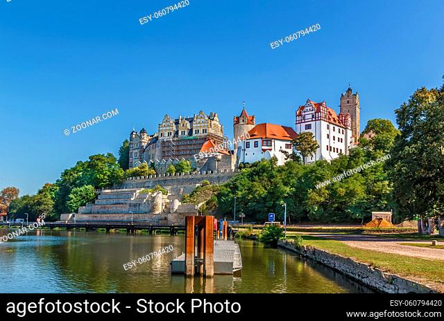 View of Renaissance castle from Saale river in Bernburg, Germany