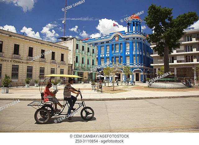 Bici Taxi in front of the Santa Cecilia Convention Center-Centro de Convenciones at the historic center, Camagüey, Cuba, West Indies, Central America