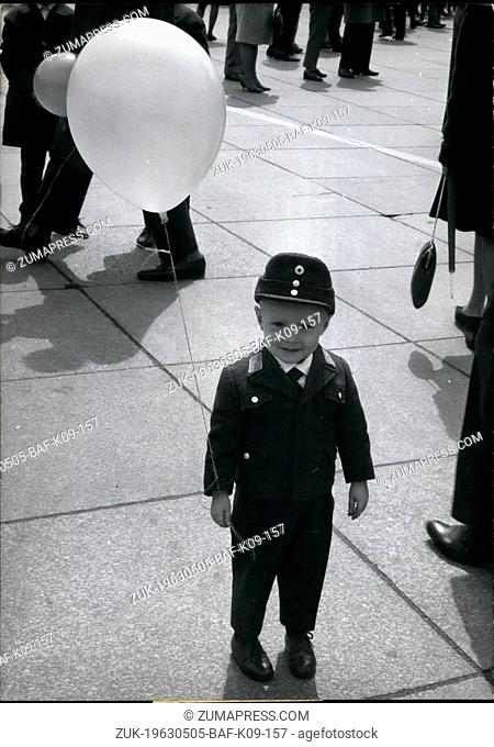 May 05, 1963 - The youngest and smallest Red Cross Helper on the Munich Konigsplatz (King Place), where took place the centenary of the Red Cross on May 19th