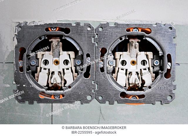 Open plug sockets, building renovation, Germany, Europe