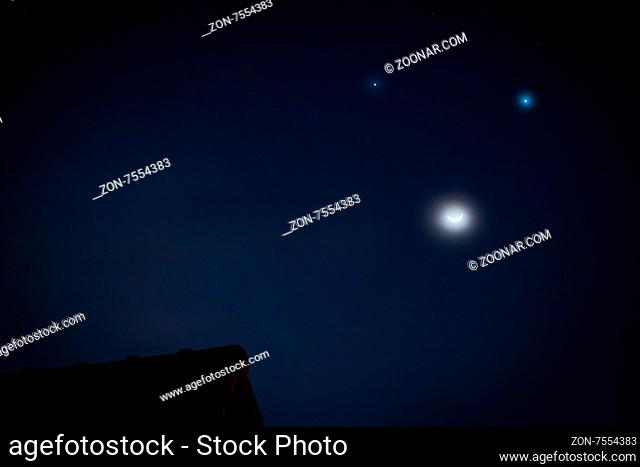 The phenomenon Celestial triangle: Moon, Venus and Jupiter -like smiling. June 20 2015
