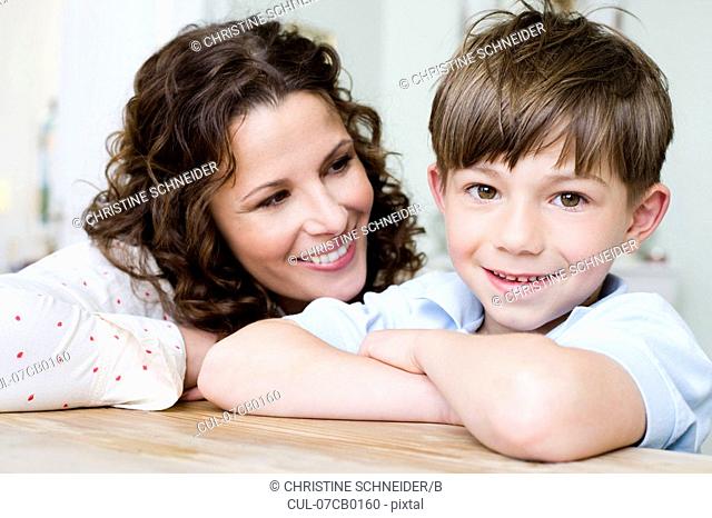 Woman smiling at her young boy