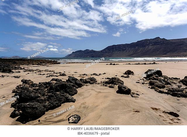 Famara beach, Playa de Famara, in the back Risco de Famara, Lanzarote, Canary Islands, Spain
