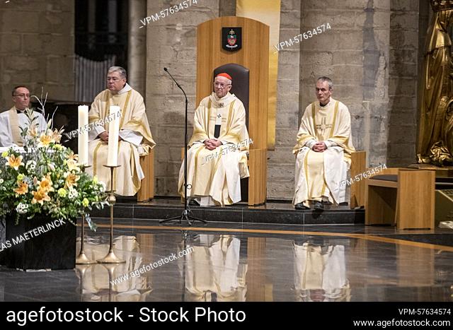 Cardinal and Archbishop Jozef De Kesel (2R) pictured during the celebration of the Midnight mass on Christmas eve at the 'Kathedraal van Sint-Michiel en...
