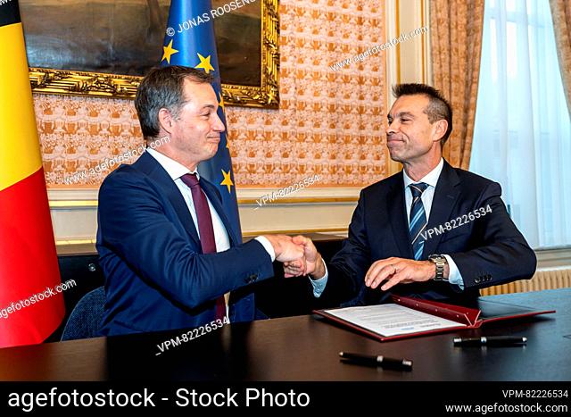 Prime Minister Alexander De Croo and Engie Belgium CEO Thierry Saegeman are pictured during a press moment after an agreement was found between federal...