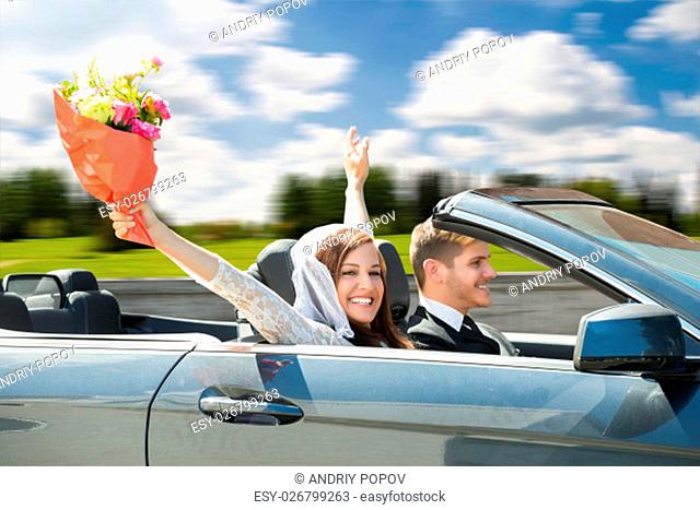 Newlyweds Young Couple Traveling In The Car