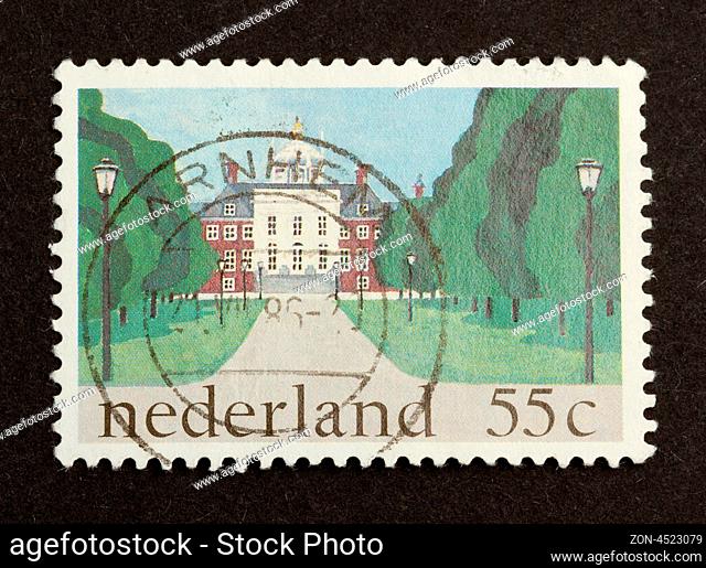 HOLLAND - CIRCA 1980: Stamp printed in the Netherlands shows a large building, circa 1980