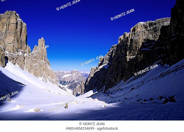 Italy, Trentino-Alto Adige, Alta Badia, skiers touring climbing up the Piz Boe