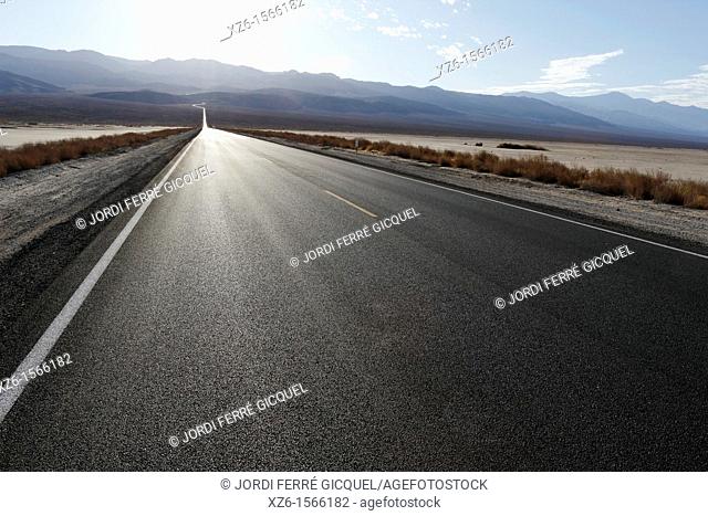 Road across desert, Death Valley National Park, California, USA