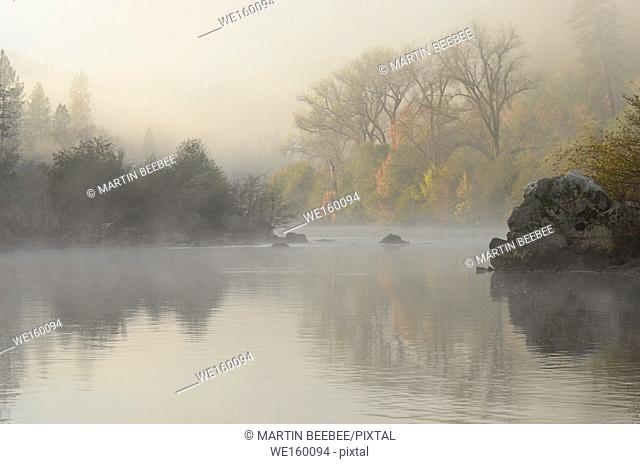 South Fork American River shrouded in early morning mist, near Lotus, California