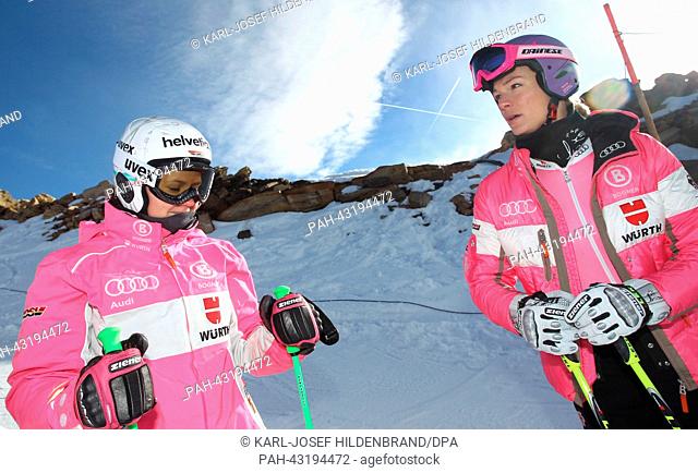 German ski racers Maria Hoefl-Riesch (R) and Viktoria Rebensburg look on during the Media Day of German Ski Association (DSV) at the Moelltaler Gletscher ski...
