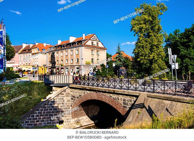 Olsztyn, Warmian-Masurian / Poland - 2018/06/16: Bridge over the Lyna river in historical quarter of Olsztyn old town