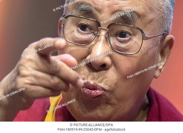 19 September 2018, Hessen, Darmstadt: The Dalai Lama speaks at a symposium on ""Nonviolence is the way"". The spiritual leader of the Tibetans is in Hesse for a...
