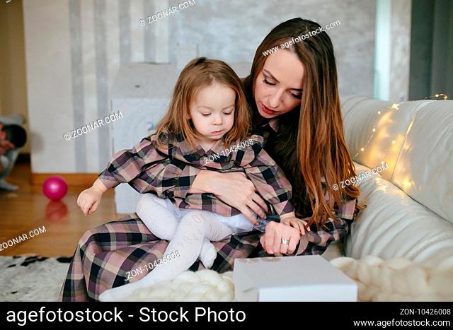 picture of beautiful young mother with adorable baby